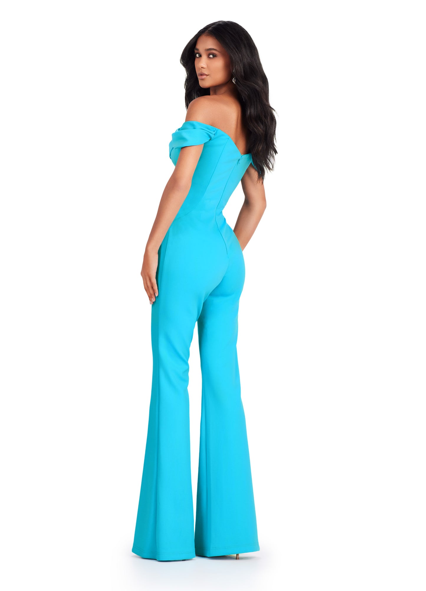 Elevate your formal wear game with the Ashley Lauren 11532 Prom Off Shoulder Scuba Jumpsuit. Featuring an off shoulder design, this jumpsuit adds a touch of sophistication to your prom look. Made with high-quality scuba material, it offers a comfortable fit for a night of dancing and fun. Perfect for making a statement on the dance floor. This off the shoulder scuba jumpsuit features elegant bustier draping that flows along the off shoulder straps.