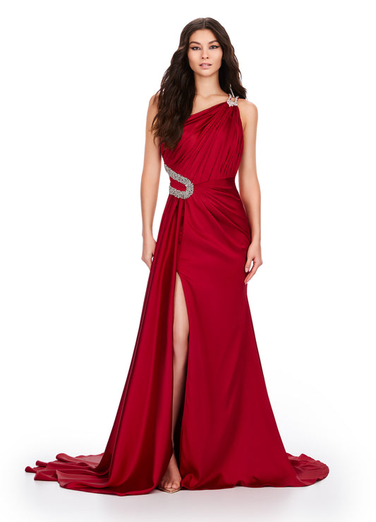 Look stunning in this Ashley Lauren 11537 Long Prom Dress. The one shoulder design and draped satin fabric flatter your figure, while the intricate beading adds a touch of elegance. Perfect for formal events and pageants. Slay at your next event in this one shoulder satin gown. This dress features a draped design with beaded straps and waist accents. The side skirt helps add a touch of glamour.