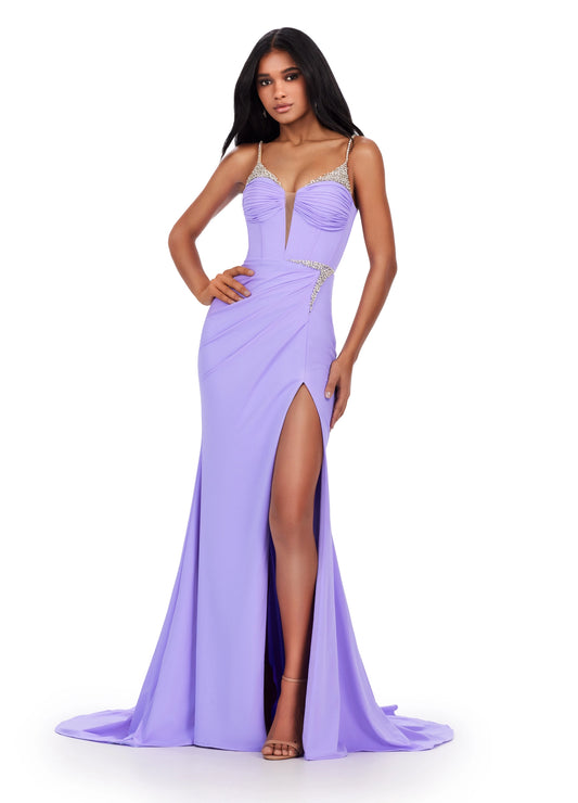 The Ashley Lauren 11538 Long Jersey Maxi Slit Corset Prom Dress offers an unforgettable look with its crystal straps and corset-style top for a flattering fit. Its maxi length and side slit give a modern edge to this beautiful evening gown. Classic and fabulous! This jersey gown features beaded spaghetti straps and a ruched skirt with beaded accents.