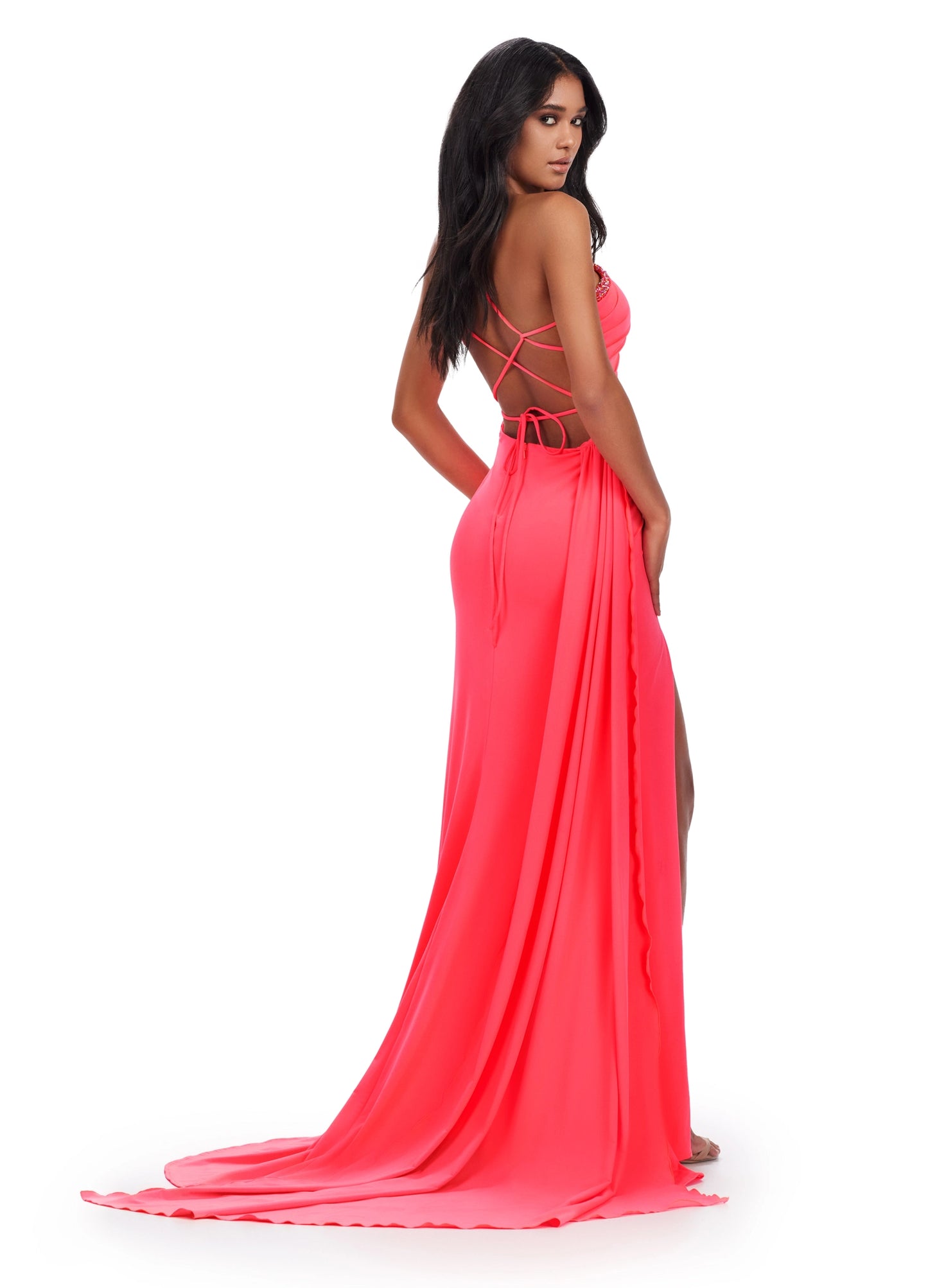 Look stunning at your next event with the Ashley Lauren 11539 long jersey one shoulder dress. This chic overskirt features a backless corset with a slit prom cut out and pageant detail. You will be sure to wow in this elegant evening gown. Be fabulously elegant in this one shoulder jersey gown. This dress features beaded details, cut outs and a lace up back complete with a side skirt for added drama.  COLORS: Coral, Lime, Black