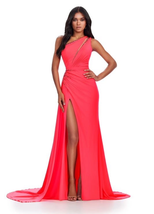 Look stunning at your next event with the Ashley Lauren 11539 long jersey one shoulder dress. This chic overskirt features a backless corset with a slit prom cut out and pageant detail. You will be sure to wow in this elegant evening gown. Be fabulously elegant in this one shoulder jersey gown. This dress features beaded details, cut outs and a lace up back complete with a side skirt for added drama.  COLORS: Coral, Lime, Black