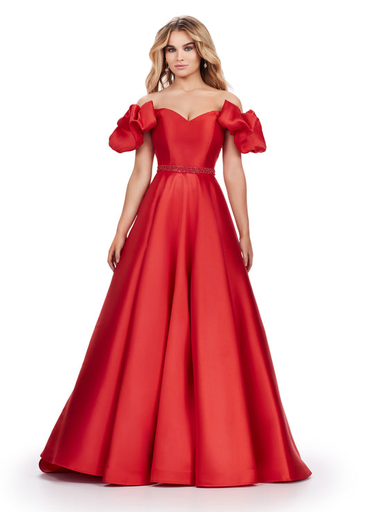 Elevate your prom night look with the Ashley Lauren 11542 long prom dress. Featuring an off-shoulder neckline and a gorgeous ball gown silhouette, this formal pageant gown is crafted from Mikado fabric for a luxurious feel. The puff sleeves add a playful touch, making you stand out from the crowd. Off the shoulder Mikado ball gown with puff sleeve details. The look is complete with a beaded waistline.