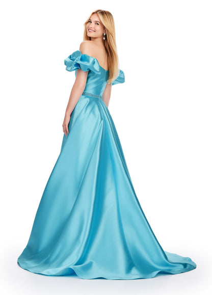 Elevate your prom night look with the Ashley Lauren 11542 long prom dress. Featuring an off-shoulder neckline and a gorgeous ball gown silhouette, this formal pageant gown is crafted from Mikado fabric for a luxurious feel. The puff sleeves add a playful touch, making you stand out from the crowd. Off the shoulder Mikado ball gown with puff sleeve details. The look is complete with a beaded waistline.
