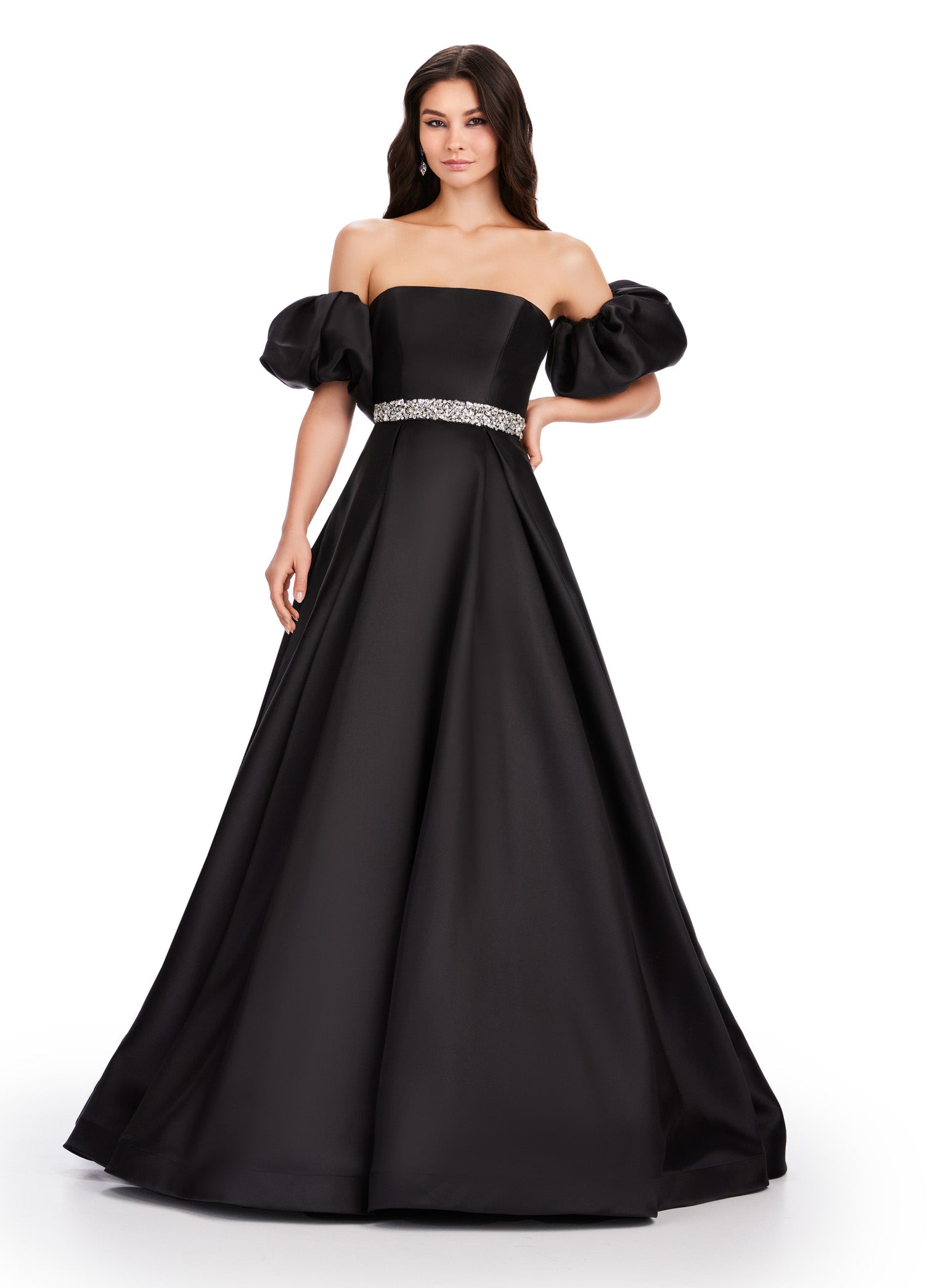 Elevate your formal look with the Ashley Lauren 11543 Long Prom Dress. The off-shoulder, puff sleeve design exudes elegance while the Mikado ball gown silhouette adds drama. Perfect for proms, pageants, and other formal occasions. his classic strapless Mikado ball gown features a beaded waist band. The look is complete with detachable puff sleeves.