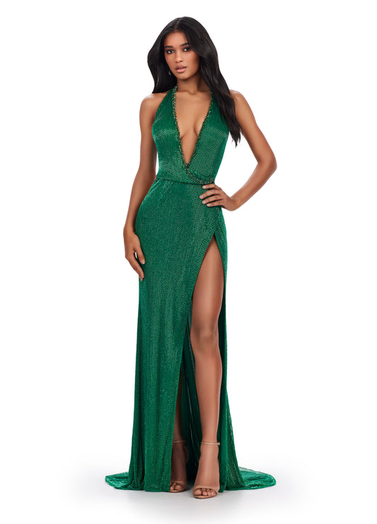 The Ashley Lauren 11547 Long Prom Dress is a stunning liquid beaded gown that is perfect for any formal occasion. Its open back and left leg slit add a touch of elegance, while the high-quality construction ensures a comfortable and flattering fit. Make a statement and turn heads with this gorgeous pageant gown. Plunging v-neckline liquid beaded gown with high left leg slit.