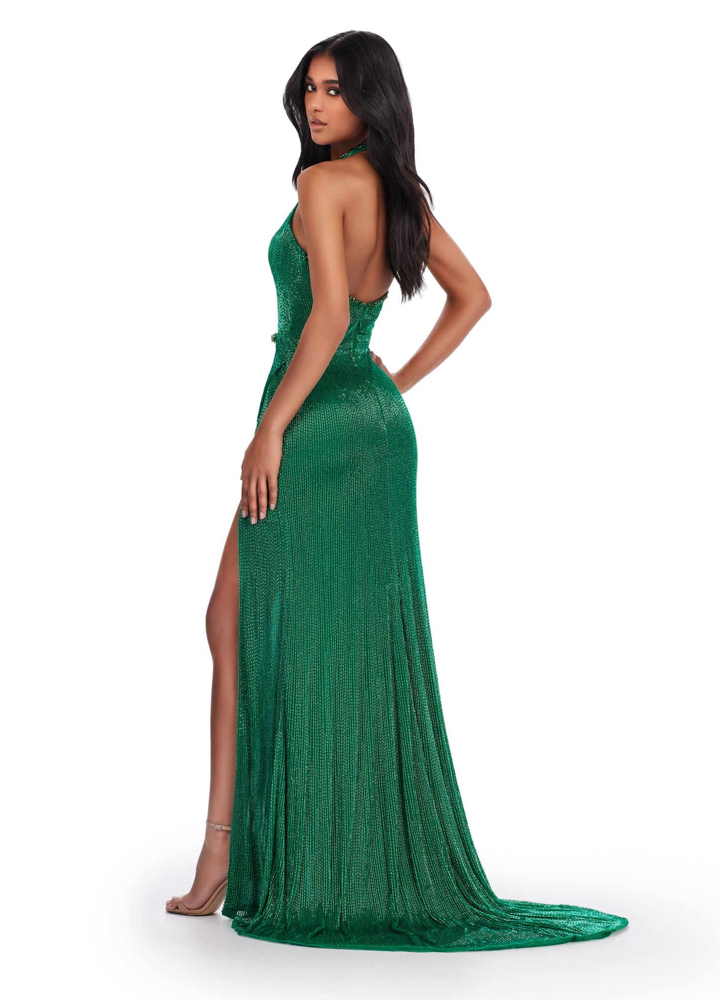 The Ashley Lauren 11547 Long Prom Dress is a stunning liquid beaded gown that is perfect for any formal occasion. Its open back and left leg slit add a touch of elegance, while the high-quality construction ensures a comfortable and flattering fit. Make a statement and turn heads with this gorgeous pageant gown. Plunging v-neckline liquid beaded gown with high left leg slit.