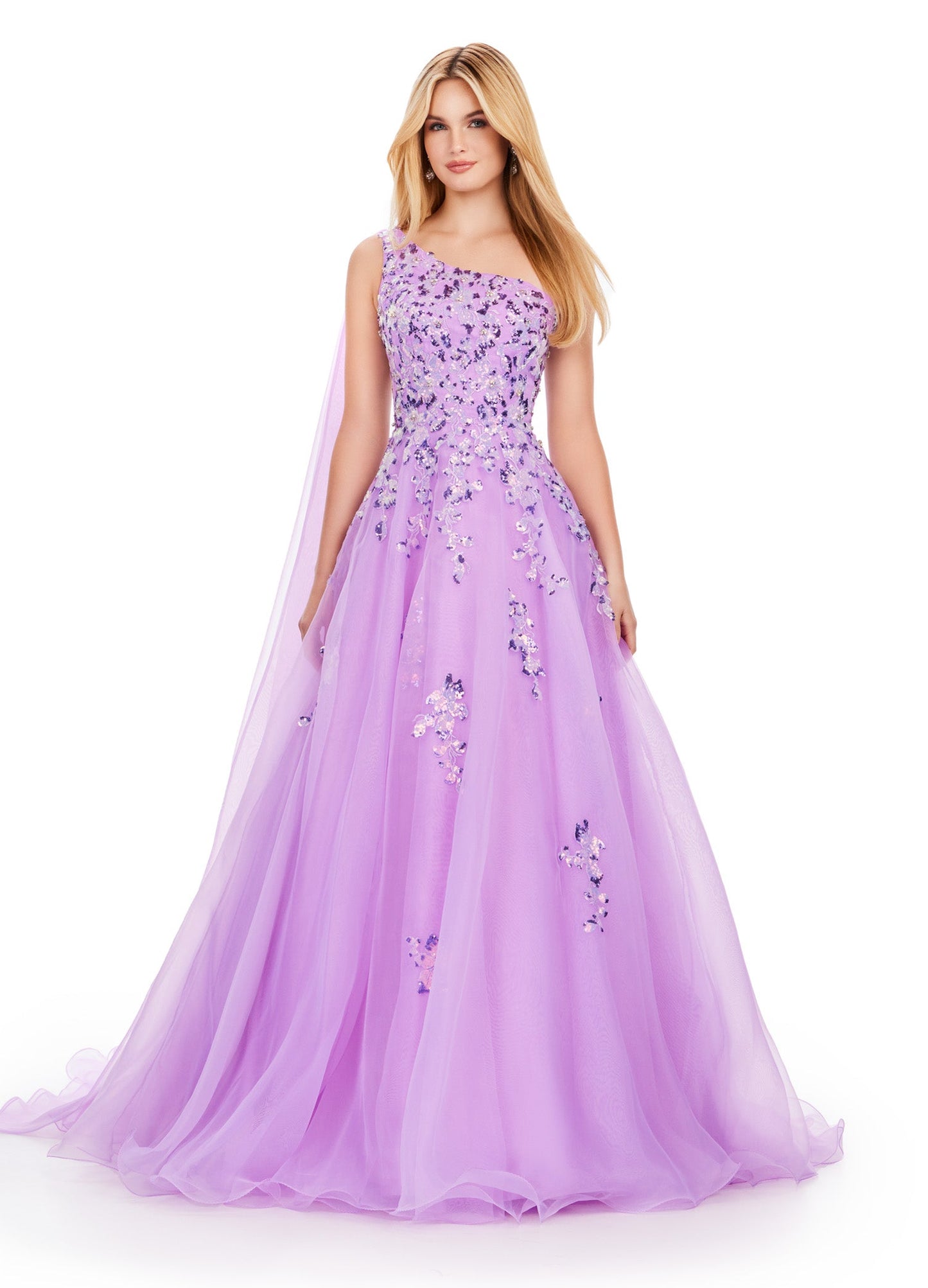 This Ashley Lauren 11573 Long Prom Dress exudes elegance with its one shoulder design and sequin applique. Crafted from high-quality organza, this gown will make you stand out at any formal event or pageant. Its classic silhouette and sparkling details are perfect for making a statement. This romantic one shoulder organza ball gown features intricate sequin applique. The look is complete with an open back and a one shoulder cape.