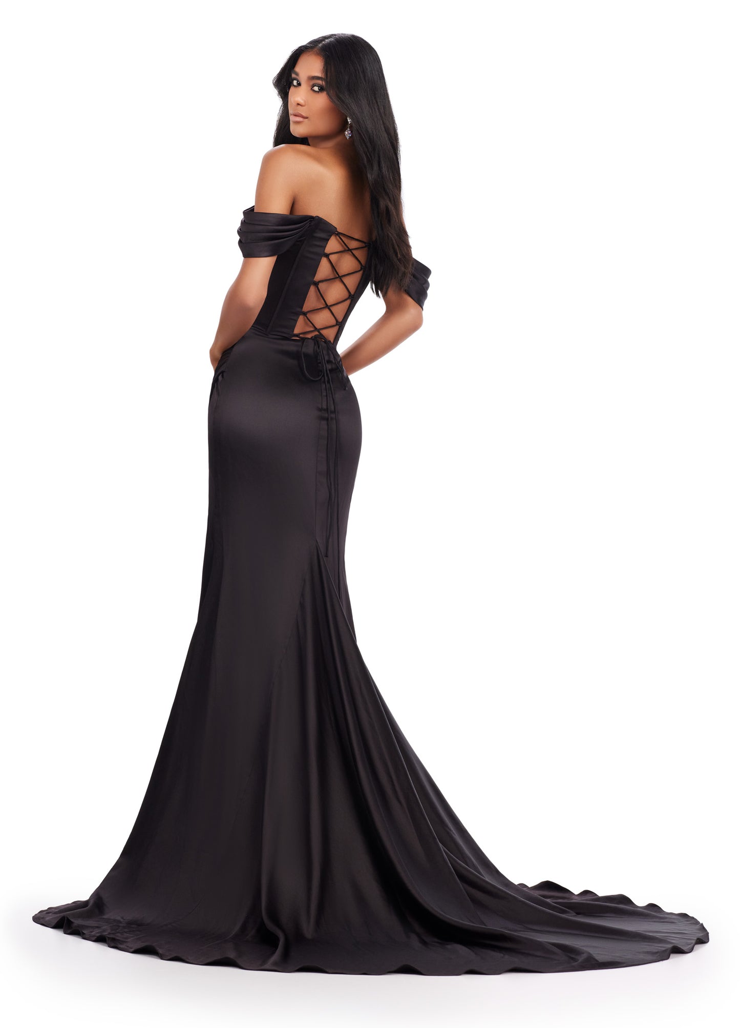 Expertly crafted by Ashley Lauren, this long prom dress features a stunning corset, elegant off shoulder design, and luxurious satin fabric. The daring high slit and flattering ruched hip accentuate your figure, making it perfect for formal events and pageants. Elevate your style with this exquisite gown. This strapless satin gown with corset bustier is accented by an elegantly draped skirt with slit. The look is complete with a sweep train and lace up back.