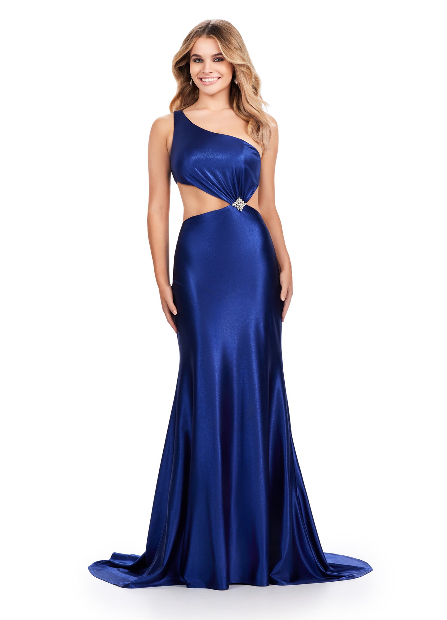 xpertly designed by Ashely Lauren, this elegant 11577 Long Prom Dress features a fitted one shoulder satin gown with stylish cut outs and intricate beading. Perfect for formal events and pageants, it offers a sophisticated and flattering silhouette for any occasion. Elevate your style with this stunning gown. This simplistic, yet elegant one shoulder satin gown features an elegantly draped bodice leading to a side cut out. The look is accented by a beaded brooch.
