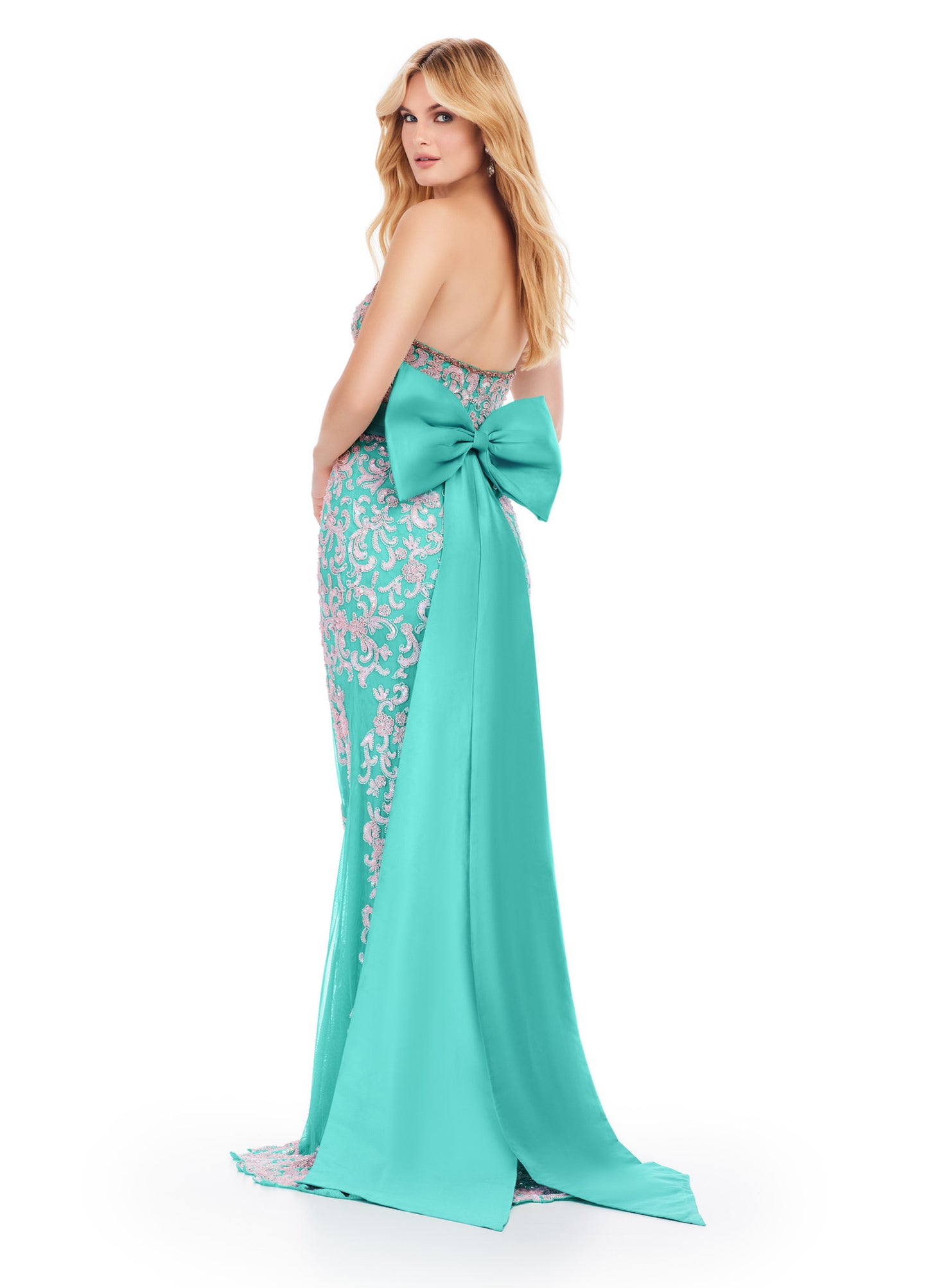 The Ashley Lauren 11583 Long Prom Dress is the perfect choice for any formal occasion. Its strapless design and fully beaded taffeta fabric create a stunning silhouette, while the included belt and bow add elegant finishing touches. Look and feel like a pageant queen in this exquisite gown. Who doesn't love a good bow moment? This strapless, fully beaded gown features an intricate beaded design and a taffeta belt and oversized bow.