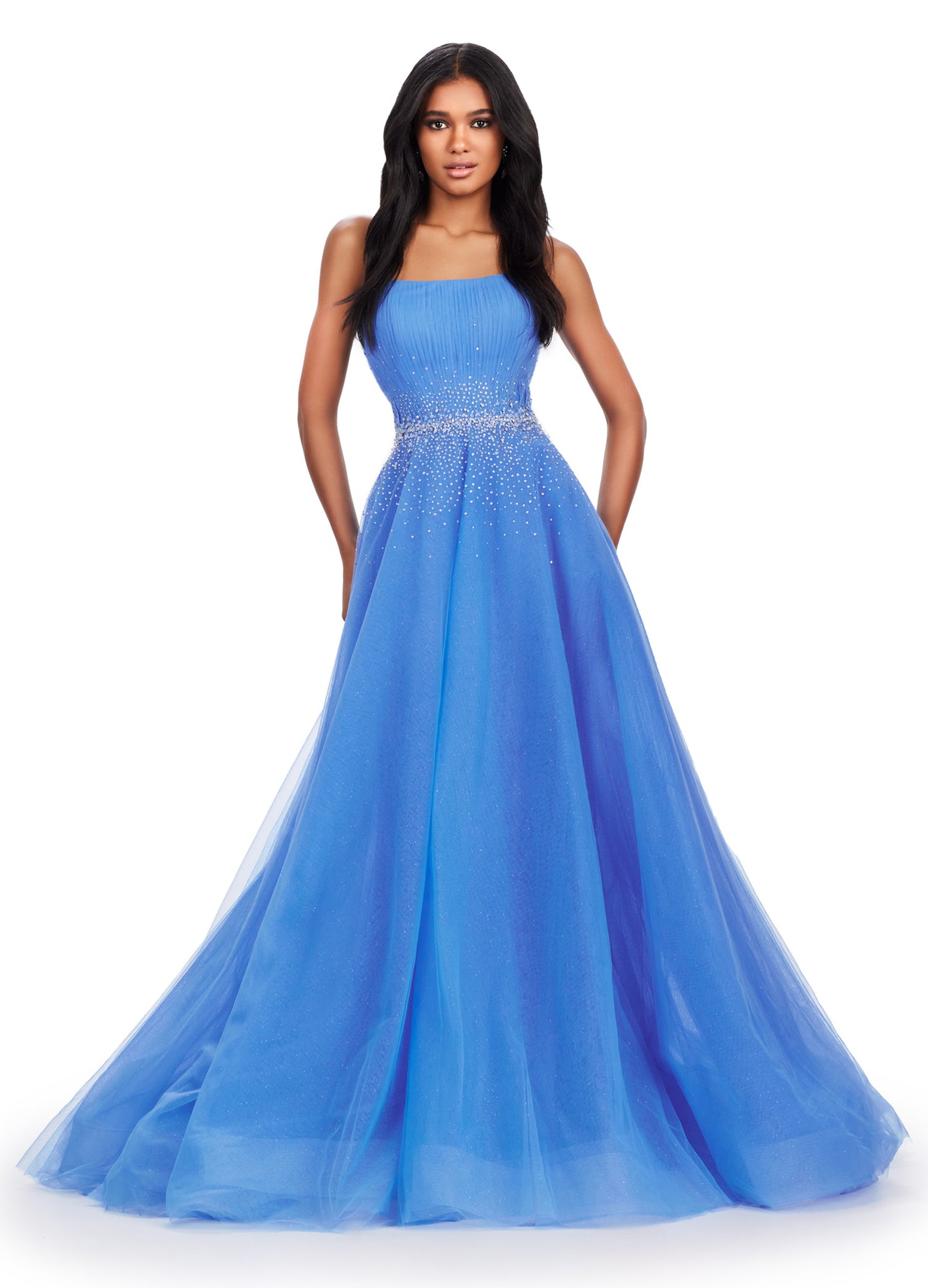 Expertly crafted by Ashley Lauren, this 11597 Long Prom Dress exudes timeless elegance. The strapless design coupled with glittery tulle creates a stunning ball gown silhouette. Adorned with a beautiful beaded belt, this formal pageant gown is a perfect choice for any special occasion. The perfect dress fit for a princess. This strapless glitter tulle ball gown features a beaded waist detail that'll be sure to make you sparkle at your next event!