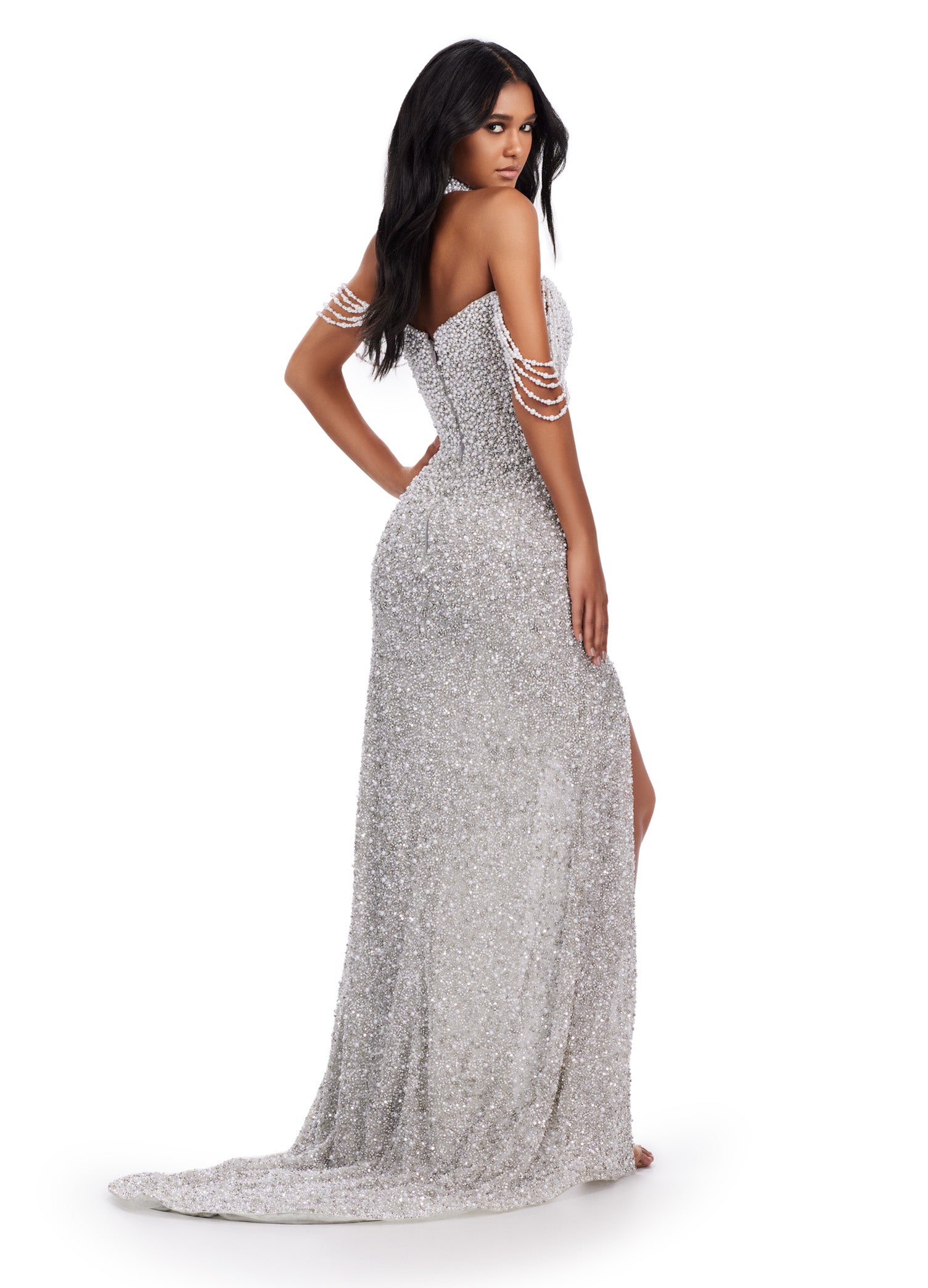 Expertly crafted by Ashley Lauren, this 11598 Long Prom Dress is a true work of art. With its full beaded design and delicate pearls and crystals, this formal gown exudes elegance and sophistication. Perfect for prom or pageants, this dress is sure to make you stand out and shine. Serve a look in this fully beaded gown encrusted with pearls and crystals. This dress features an off shoulder design and a fully beaded matching choker.