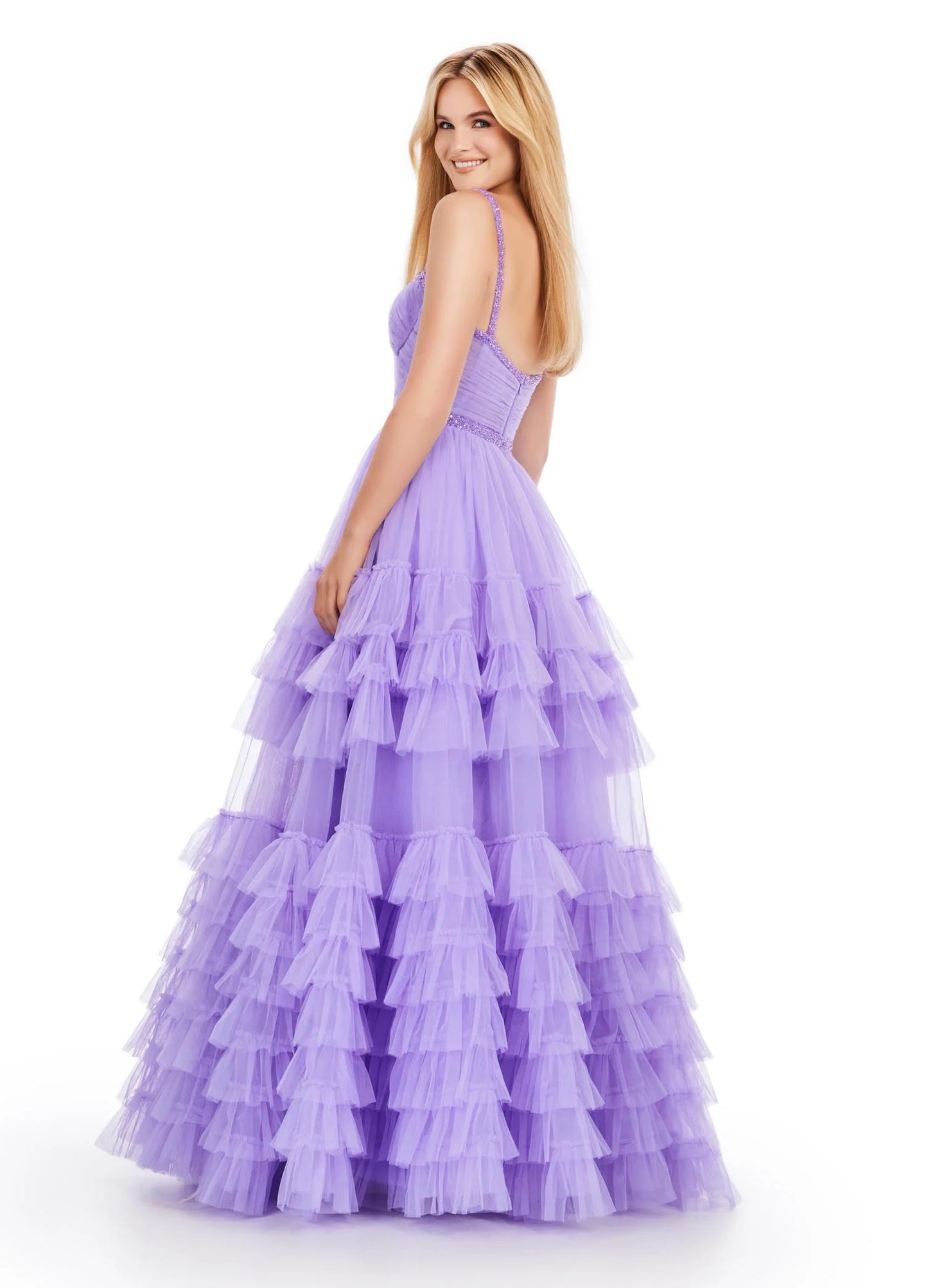 The Ashley Lauren11603 Long Tulle Ruffle Layer Ballgown Prom Dress is the perfect choice for your special occasion. With a beaded corset and ruffled layers for movement, this gown adds the perfect amount of glamour and elegance.