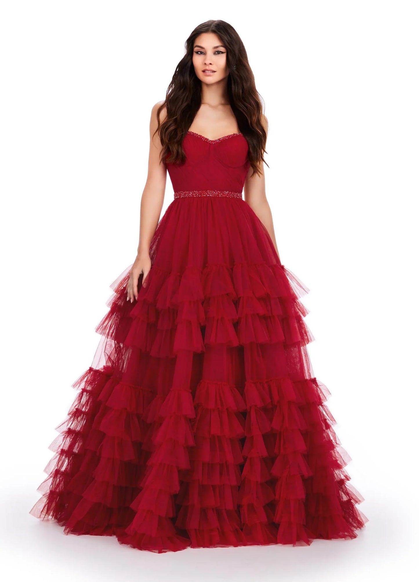 The Ashley Lauren11603 Long Tulle Ruffle Layer Ballgown Prom Dress is the perfect choice for your special occasion. With a beaded corset and ruffled layers for movement, this gown adds the perfect amount of glamour and elegance.