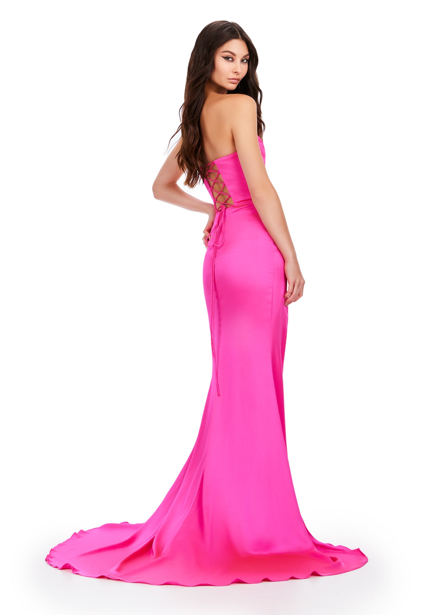 Get ready to make a statement in the Ashley Lauren 11605 Long Prom Dress. This stunning gown features a strapless sweetheart neckline and a satin material that will hug your curves in all the right places. The lace-up back and thigh-high slit add a touch of drama and sophistication. Stand out at your next formal event with this elegant and stylish prom dress. A timeless classic! This strapless satin dress features ruched detail throughout. The lace up back and right leg slit complete the look.
