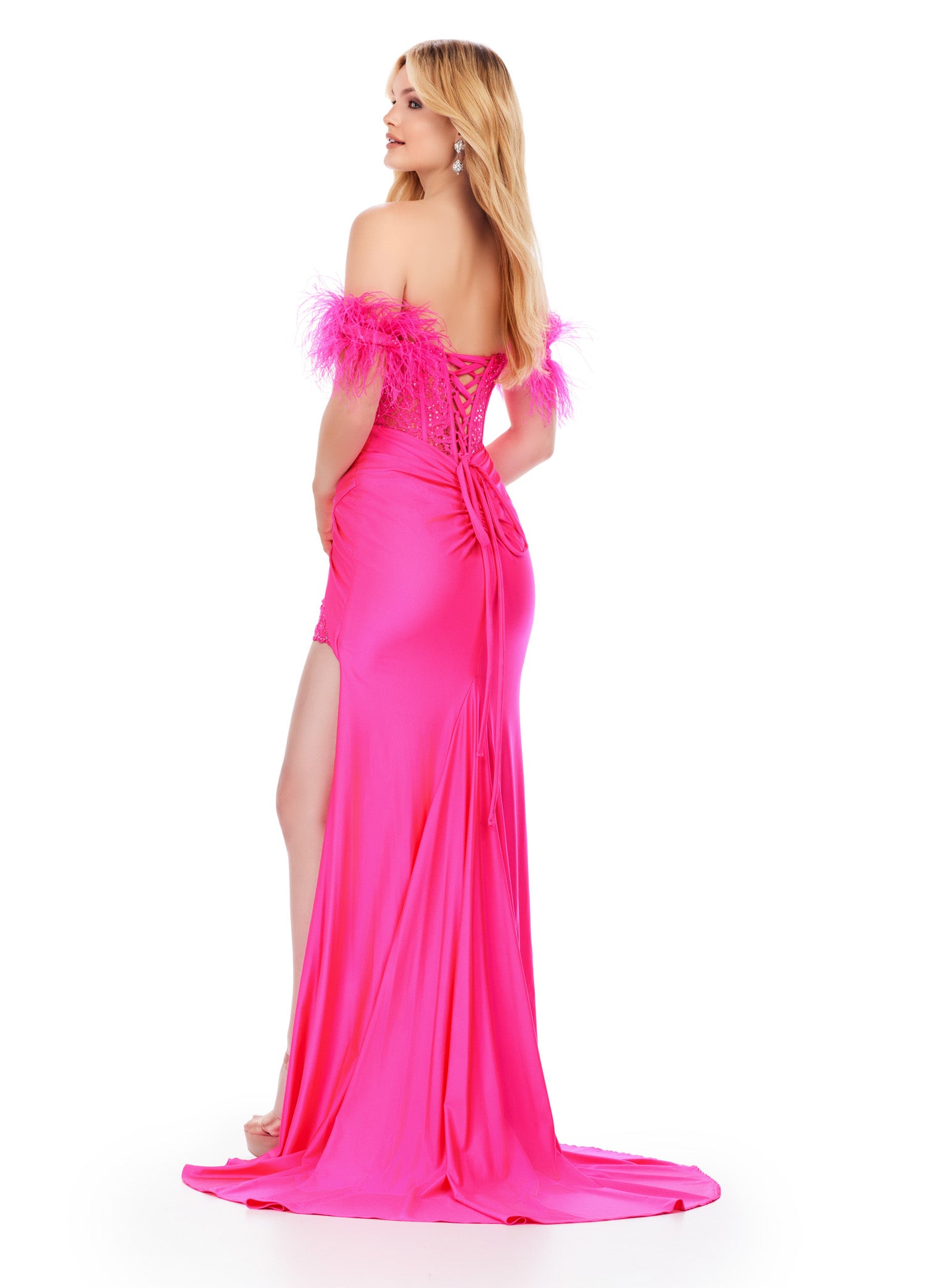 Stay on-trend with the Ashley Lauren 11618 Long Prom Dress. Featuring a corset, off-shoulder design, and intricate lace applique, this formal gown exudes elegance. The feather straps add a touch of whimsy, while the slit allows for effortless movement. Perfect for prom or pageants. Slay the night away in this fabulous embroidered jersey gown. This dress features a corset bustier with a lace up back and off shoulder feather straps.