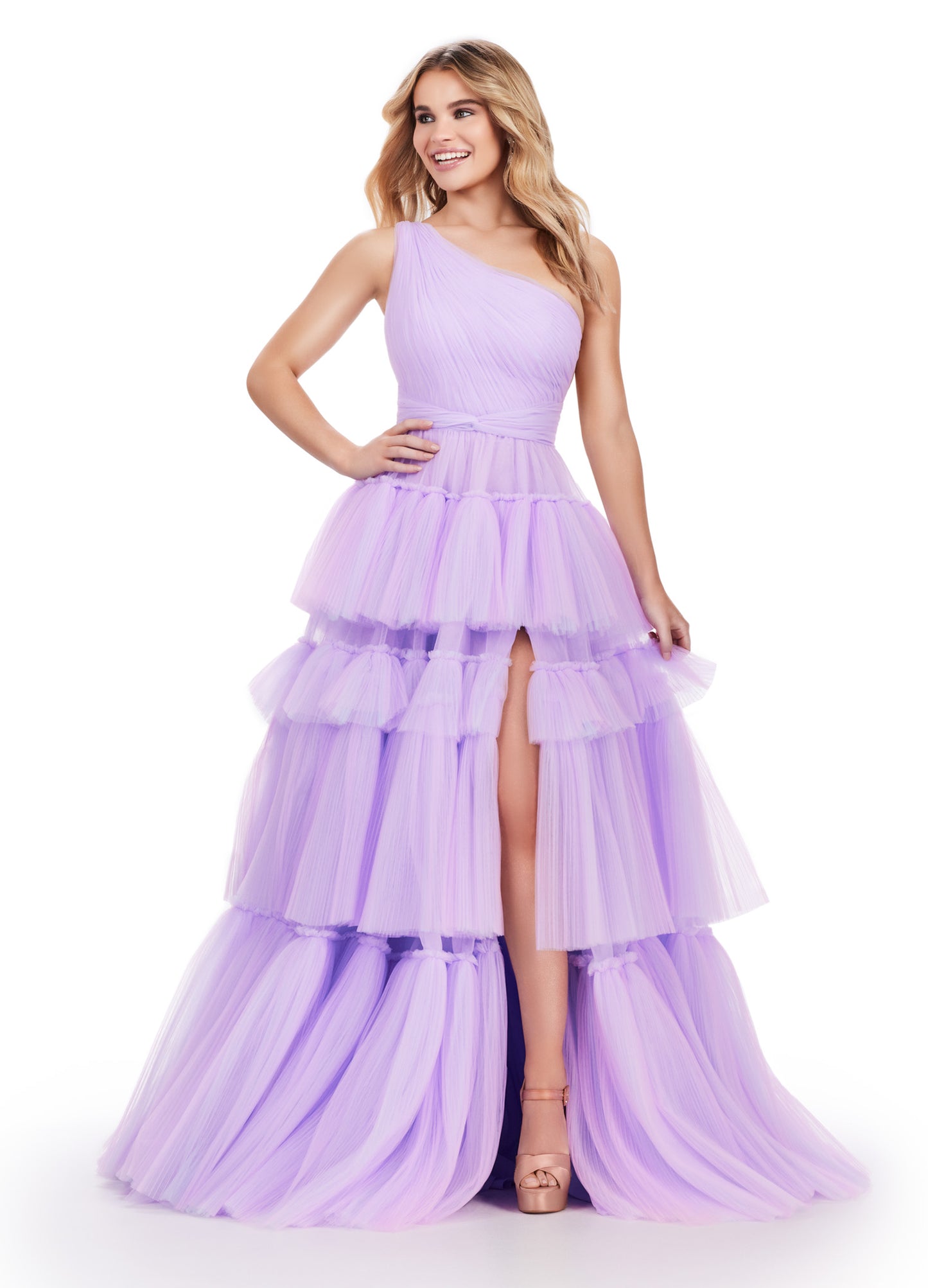 Turn heads at prom or pageants with the Ashley Lauren 11619 Long Prom Dress. This stunning two-tone tiered tulle ball gown features a sleek left leg slit, adding a touch of elegance to your look. Expertly crafted with top-quality materials, this dress is perfect for making a statement and feeling confident. Tiered dreams! This two-tone tired tulle ball gown features a one shoulder design and a left leg slit.