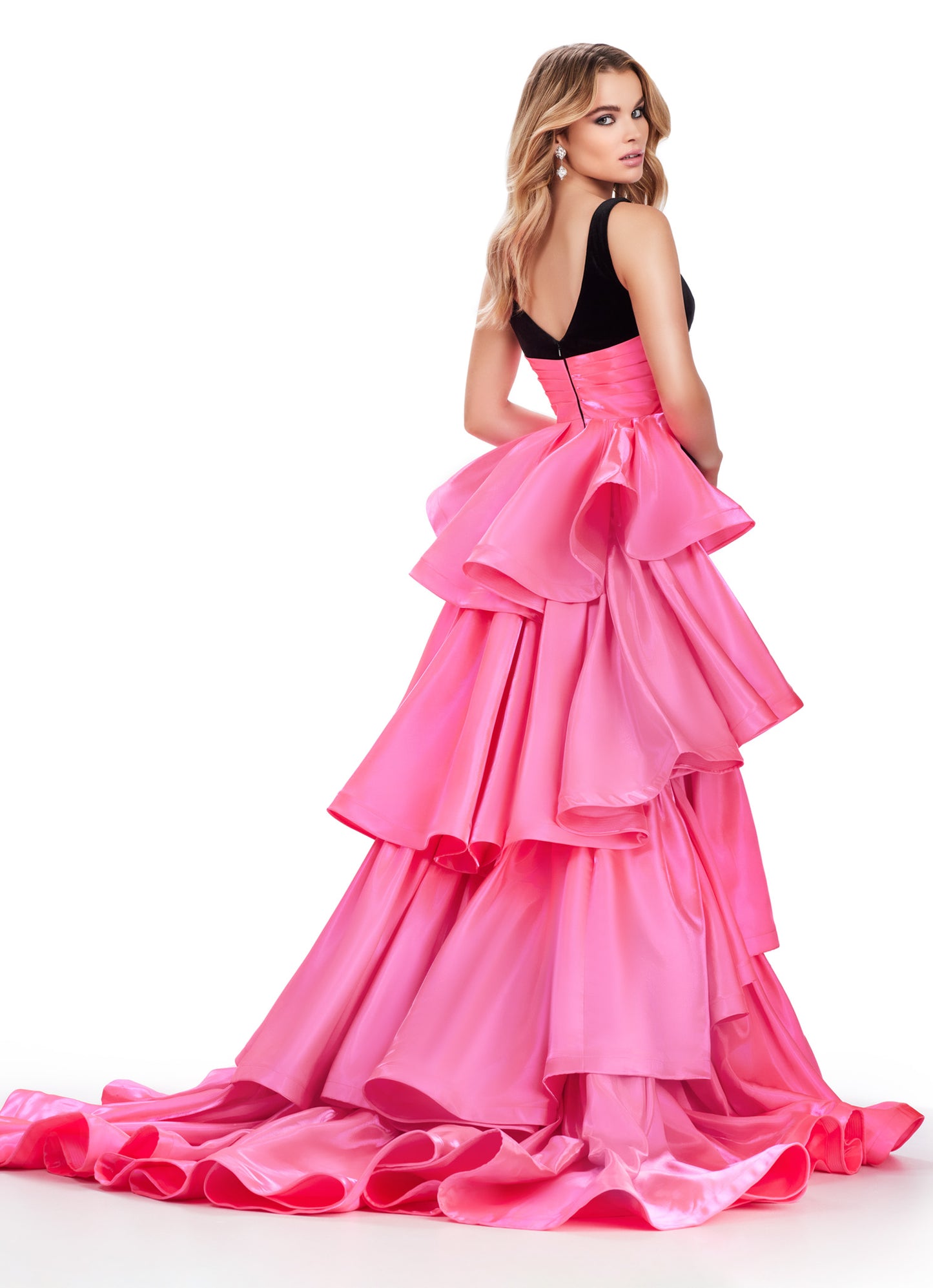 Be the belle of the ball in the Ashley Lauren 11643 Long Prom Dress. Made with luxurious velvet and satin, this fitted gown features a sophisticated V neck and a stunning ruffled overskirt. Perfect for any formal event or pageant, this gown exudes elegance and grace. This stunning velvet gown is perfect for your next event. This unique v neckline gown features a gorgeous ruffled heavy satin overskirt.