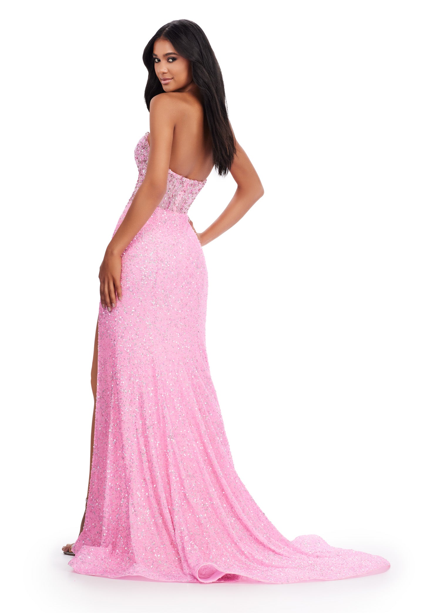 Elevate your formal look with the Ashley Lauren 11648 Long Prom Dress. Stunningly designed with a strapless, beaded corset bustier and a stylish slit, this gown exudes elegance and sophistication. Perfect for pageants and prom, it's sure to make a lasting impression. A fully beaded gown sure to make you feel like a queen! This dress features an illusion corset bustier and left leg slit.