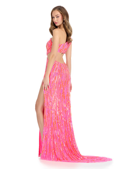 Get ready to sparkle and turn heads in the Ashley Lauren 11789 Sequin One Shoulder Prom Dress. With a dazzling sequin design and a flattering cut out detail, this formal gown is perfect for any special event. The one shoulder neckline adds a touch of elegance, while the thigh-high slit adds a hint of drama. Look and feel your best in this stunning evening gown.&nbsp;Be ready to turn heads with this fully beaded gown, featuring a slit with chic cut out sides and open back that exude confidence. With its eleg