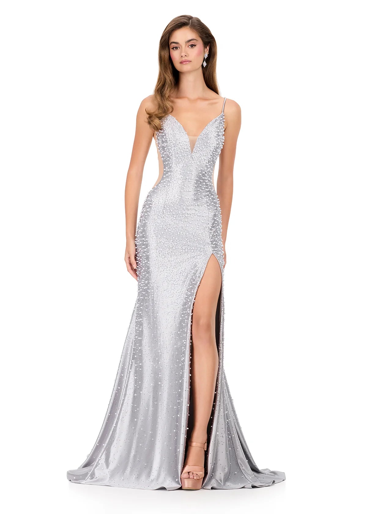 Ashley Lauren Style 12155 is a long prom dress designed for pageant and formal evening events. This elegant Pearl gown features Ashley Lauren's signature attention to fit and detail, creating a flattering silhouette that stands out on stage and in photos.