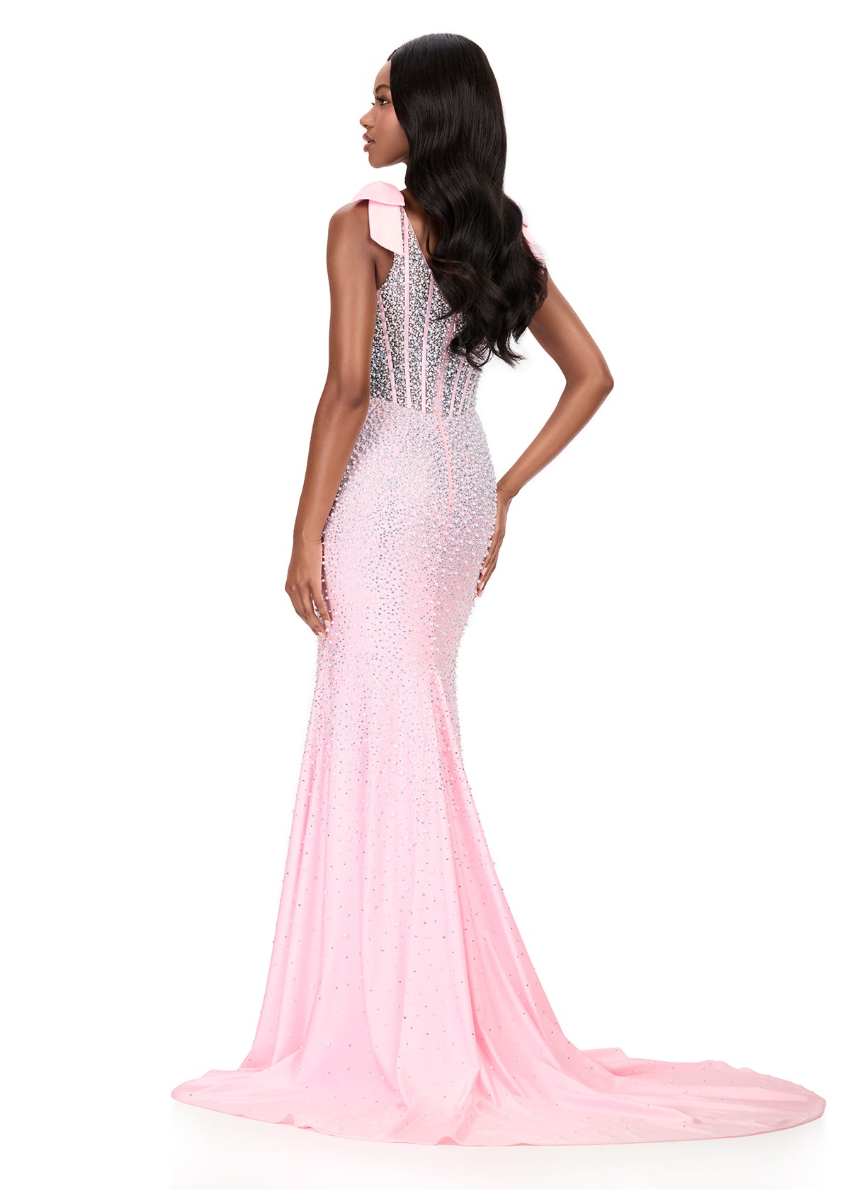 Make them stop and stare in this stunning ASHLEYlauren Style 12179 pearl jersey gown. This fitted dress features elegant bow shoulder straps, a flattering square neckline, and a v-back for a touch of sophistication. The intricate beadwork cascades beautifully down the gown, highlighting your figure and finishing with a dramatic sweep train—perfect for prom, pageant, or evening events.

Available in Red, Sky, White, Ice Pink, and Black
Perfect for Galas, Black Tie Formals, Prom, and Special Occasions
Fitted 