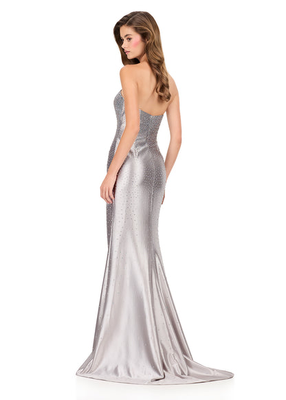 Ashley Lauren Style 12200 is a long prom dress designed for pageant and formal evening events. This elegant gown features Ashley Lauren's signature attention to fit and detail, creating a flattering silhouette that stands out on stage and in photos.

Available Colors: Cocoa, Emerald, Fuchsia, Lilac, Royal, Silver

This Ashley Lauren dress is an ideal choice for prom, pageant competitions, formal galas, and red carpet events.

Designer: Ashley Lauren
Style Number: 12200