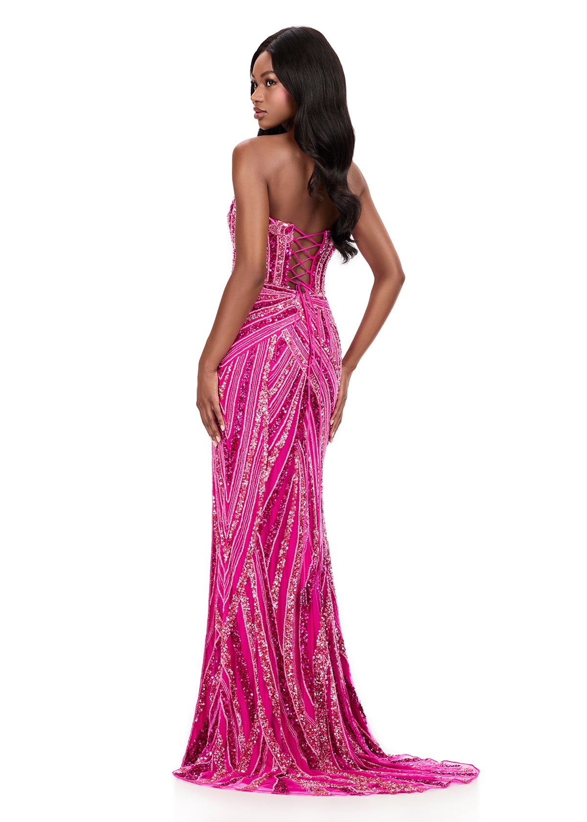 Ashley Lauren Style 12230 is a long prom dress designed for pageant and formal evening events. This elegant gown features Ashley Lauren's signature attention to fit and detail, creating a flattering silhouette that stands out on stage and in photos.