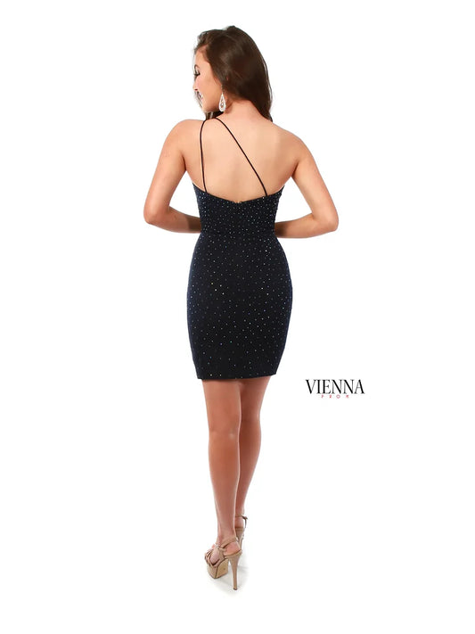 The VIENNA Prom 60043 Homecoming Dress is a sophisticated choice for special occasions. The one-shoulder silhouette and fitted design hug your curves and create an elegant look. The crystal embellishments add a touch of glamour to make a bold statement.