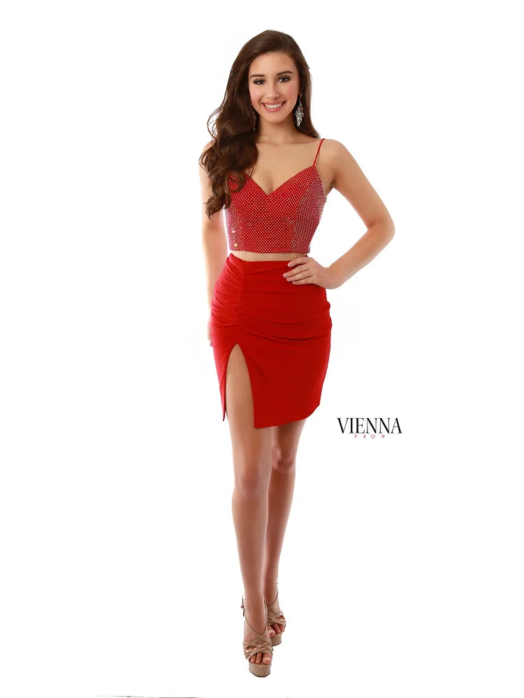 VIENNA Prom 60038 Two Piece Crystal Net Spaghetti Strap V-Neck Top Fitted Slit With Ruching Skirt Homecoming Dress. Look flawless in VIENNA Prom's 60038 dress. This two-piece ensemble features a V-neck top with crystal net accents and a ruched skirt with a fitted slit. Perfect for any homecoming event.