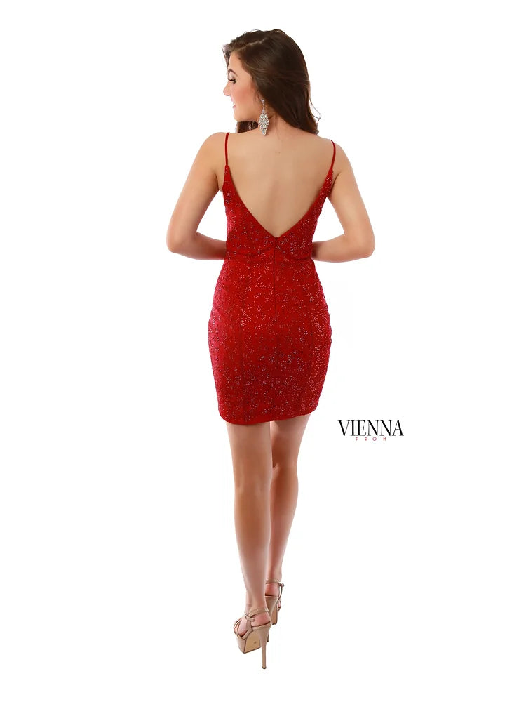 VIENNA Prom 60034 Plunging V-Neck Fully Embellished Crystal Side Cut Out Cocktail Homecoming Dress. This stunning prom dress from VIENNA Prom features a plunging v-neckline with a fully embellished crystal bodice, and side cut-out detail. The perfect combination of elegance and modernity, this dress is sure to have heads turning.