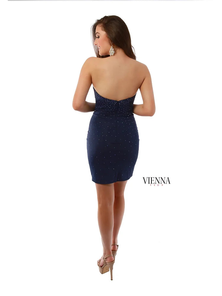 VIENNA Prom 60042 Sweetheart Neckline Fitted Crystal Embellished Cocktail Homecoming Dress. Introducing the VIENNA Prom 60042 dress, a stunning fitted cocktail dress with crystal-embellished sweetheart neckline for a glamorous look. Featuring breathable, comfortable stretchy fabric and a knee-length silhouette, this dress is perfect for homecoming, prom, and formal events.