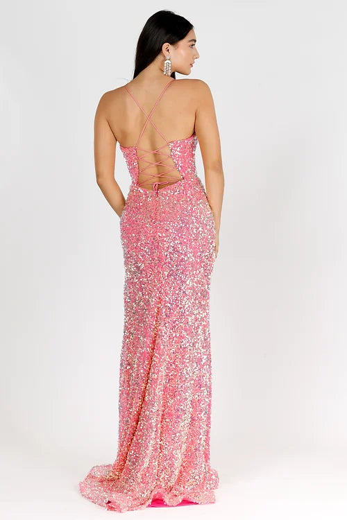 Make a statement at prom or pageants with the Vienna Prom 8846 dress. This elegant gown features a sequined velvet bodice, a V-neckline, and a high slit with fringe details. Look and feel confident in this formal dress that combines style and comfort.
