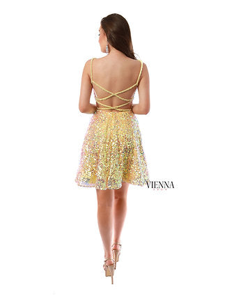 VIENNA Prom 65009 Plunging V-Neck Sequin Lace Up Back Short Cocktail Homecoming Dress. The VIENNA Prom 65009 is a perfect dress for any special occasion. Crafted from a luxurious sequined lace, the dress features a plunging V-neck and an open back laced with a criss-cross detail for a touch of drama. With a tailored fit that hugs the body just right, it's sure to make a statement.