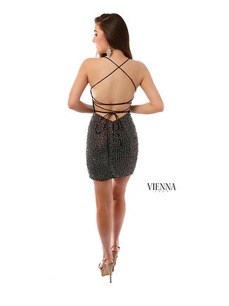 VIENNA Prom 60031 Scoop Neck Fully Embellished Crystal Lace Back Spaghetti Strap Cocktail Homecoming Dress. This elegant VIENNA Prom dress is crafted with a scoop neckline and fully embellished with crystals and lace, creating a glamorous look. The spaghetti straps and crystal lace back add a delicate, sophisticated touch, perfect for a cocktail party or homecoming event.