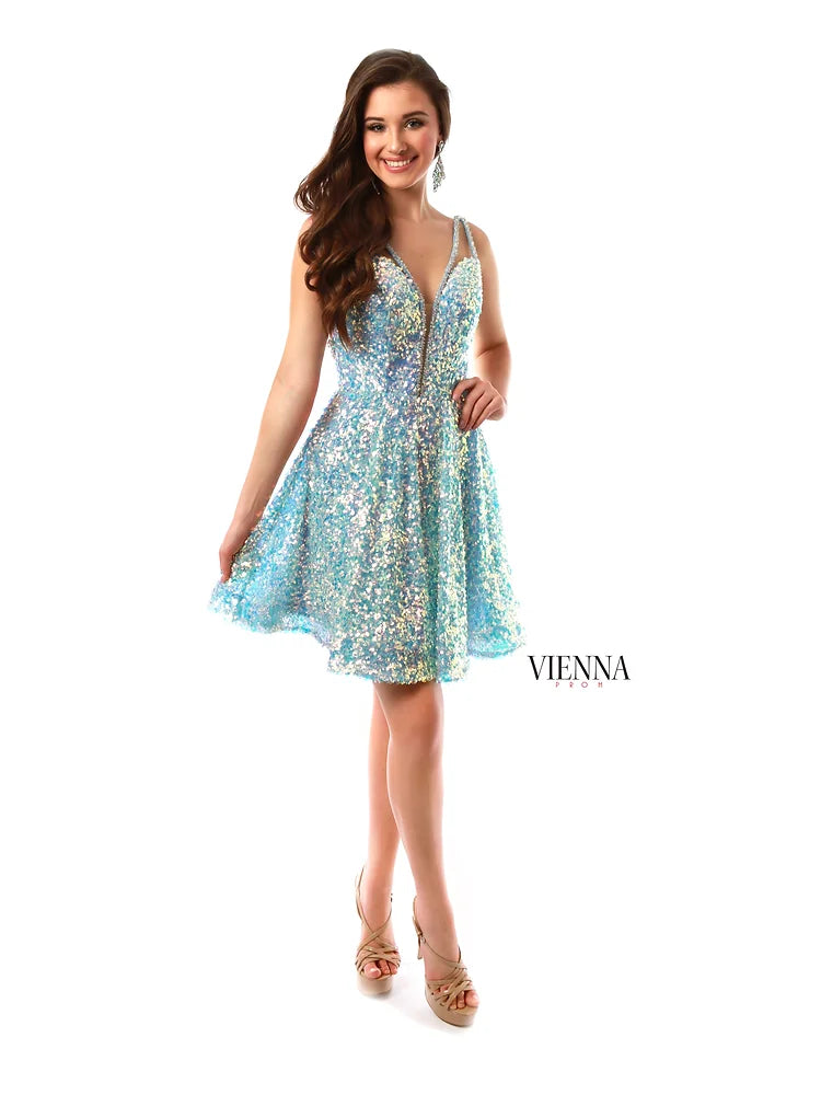VIENNA Prom 65009 Plunging V-Neck Sequin Lace Up Back Short Cocktail Homecoming Dress. The VIENNA Prom 65009 is a perfect dress for any special occasion. Crafted from a luxurious sequined lace, the dress features a plunging V-neck and an open back laced with a criss-cross detail for a touch of drama. With a tailored fit that hugs the body just right, it's sure to make a statement.