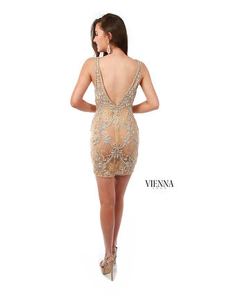 VIENNA Prom 60057 Embroidered Halter Neckline Crystal Detailing Deep V-Neck Fitted Cocktail Homecoming Dress. VIENNA Prom 60057 is an exquisitely detailed cocktail dress. With an embroidered halter neckline and sparkling crystal detailing, this deep-V neck design fits comfortably and is perfect for any special occasion. The luxurious fabric and exquisite fit make it a great choice for homecoming festivities.