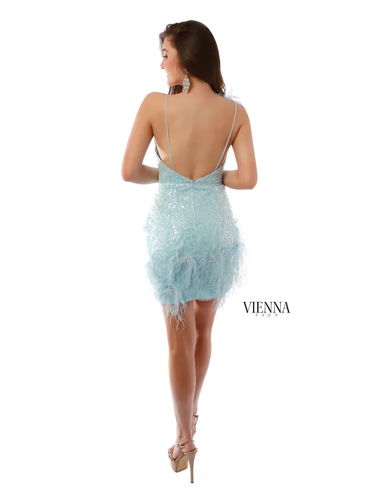 VIENNA Prom 60058 Sequin Fitted Plunging Neckline Feather Detailing On Shoulder And Bottom Cocktail Homecoming Dress. The VIENNA Prom 60058 Sequin Fitted Cocktail Homecoming Dress features a plunging neckline and feather detailing on the shoulder and bottom. This stunning fitted silhouette is perfect for special occasions. Make a statement with timeless glamour.