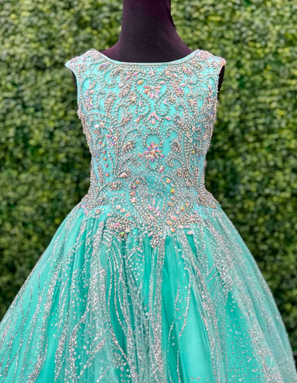 <p data-mce-fragment="1">The Tiffany Princess 13575 Pageant Dress is the epitome of elegance. Featuring a high neck and crystal embellishments, this A-line gown exudes sophistication and grace. Made with sparkling glitter and quality materials, it will make any young girl feel like royalty. Perfect for pageants or any formal event.&nbsp;</p> <p data-mce-fragment="1">Sizes: 2-16</p> <p data-mce-fragment="1">Colors: Aqua, Lilac, White</p>