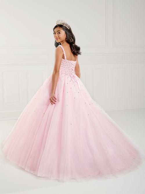 This Tiffany Princess 13739 Girls Pageant Dress is the perfect choice for preteens. The tulle material adds volume to the A-line corset ball gown while the pearl beading adds a touch of elegance. The dress is designed to make your little one stand out on stage. <span data-mce-fragment="1">Square neckline, pearls and Rhinestone fully beaded bodice, and tulle ball gown skirt. Lace-up back and sweep train.</span>
