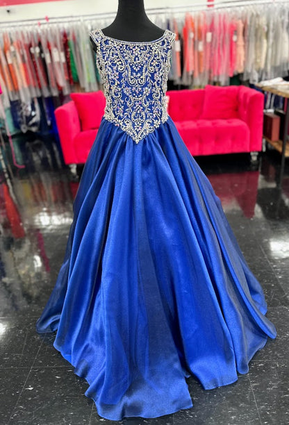 Elevate your little girl's pageant game with the Tiffany Princess 13788 dress. The stunning crystal bodice sparkles underneath the off-shoulder ballgown, making her stand out on stage. The A-line cut flatters any figure, creating a timeless and elegant look for any pageant.

Sizes: 12

Colors: Royal