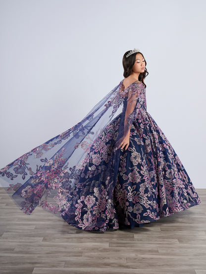 Be the belle of the ball in the Tiffany Princess 13794 Glitter Floral Girls Pageant Dress. This stunning off the shoulder ballgown features a corset bodice and a flowing cape for added drama. The glittering floral details will make you stand out from the crowd. Perfect for any pageant or special occasion.

Sizes: 2-16

Colors: Navy/Multi, Pink/Multi