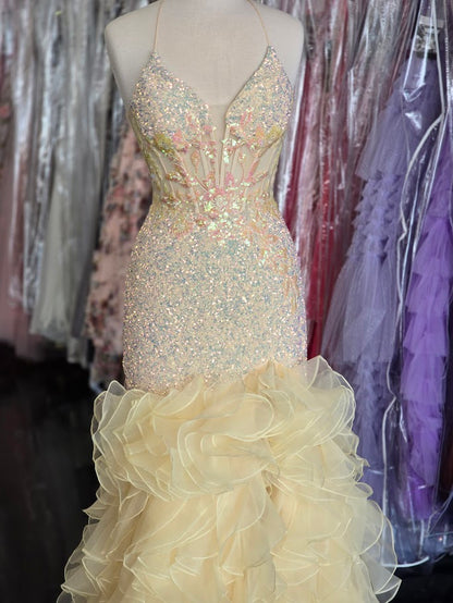 Indulge in pure luxury with the Lucci Lu 1395 Sequin Mermaid Prom Dress. The stretch fabric hugs your curves for a corset fit, while the ruffle slit adds a touch of drama. Embrace your inner mermaid and make a statement at any formal event with this exquisite gown.

Sizes: 8

Colors: Yellow