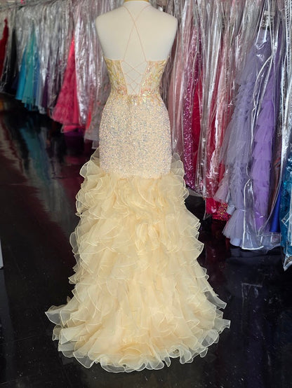 Indulge in pure luxury with the Lucci Lu 1395 Sequin Mermaid Prom Dress. The stretch fabric hugs your curves for a corset fit, while the ruffle slit adds a touch of drama. Embrace your inner mermaid and make a statement at any formal event with this exquisite gown.

Sizes: 8

Colors: Yellow