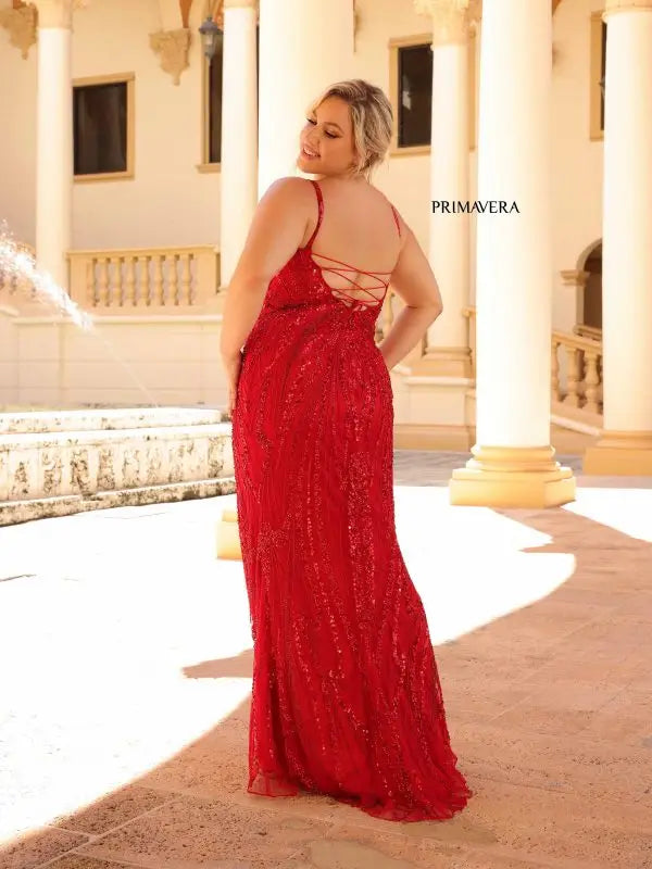 Be the star of the night in our Primavera Couture 14044 dress. This long prom dress is designed to make you stand out, with a corset back and plunging neckline that accentuates your figure. The intricate sequin detailing adds a touch of glamour to this fitted formal gown. Own the spotlight and feel confident in this plus size dress.