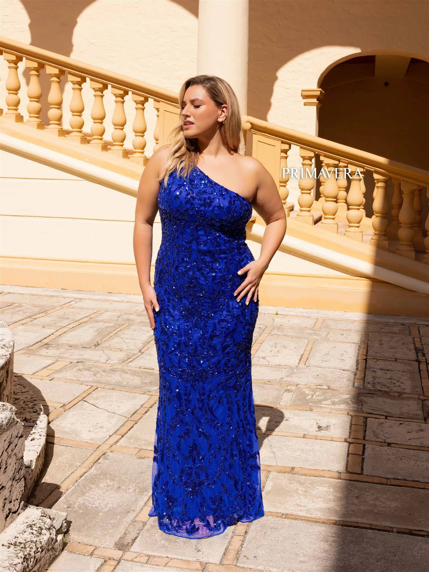 This Primavera Couture 14049 Long Prom Dress exudes glamour and sophistication. Designed with sequins for a touch of sparkle, this plus size formal gown hugs your curves in all the right places. Elevate your prom or formal event with this elegantly fitted dress.