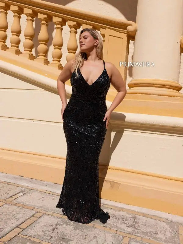 Shine bright in our Primavera Couture 14051 Long Prom Dress. This stunning plus size gown features all-over sequin detailing and a plunging neckline for a bold and glamorous look. The fitted silhouette accentuates your curves while providing a comfortable and flattering fit. Perfect for formal events, this dress is sure to turn heads and make you feel confident and beautiful.