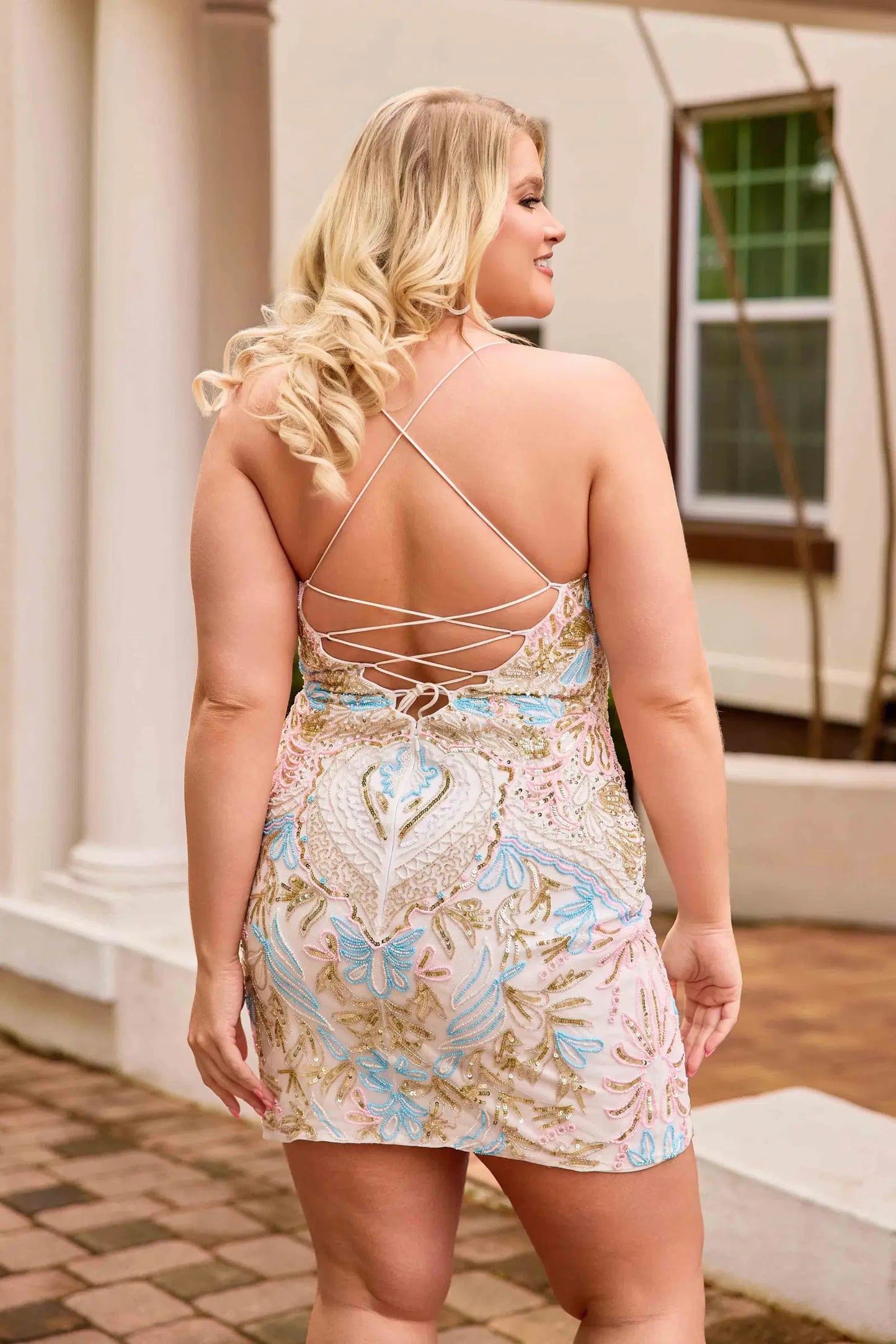 Elevate your special occasion with the Primavera Couture 14090, a plus-size short homecoming dress designed to impress. Featuring intricate beadwork and a flattering corset silhouette, this cocktail gown offers a sophisticated scoop neckline that enhances elegance and comfort. Perfect for making a memorable entrance, it combines style and confidence in one stunning piece.

Sizes: 14-24

Colors: Black, Ivory, Orchid