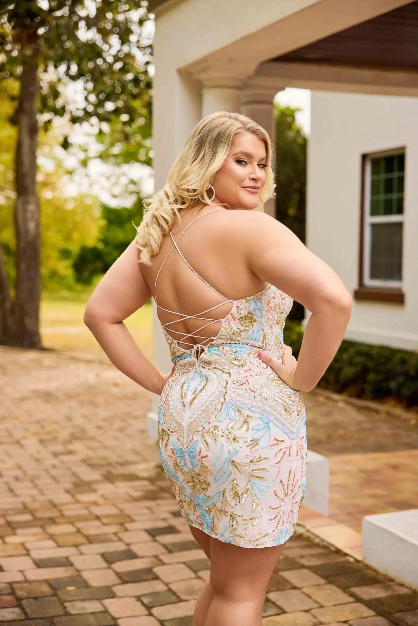 Elevate your special occasion with the Primavera Couture 14090, a plus-size short homecoming dress designed to impress. Featuring intricate beadwork and a flattering corset silhouette, this cocktail gown offers a sophisticated scoop neckline that enhances elegance and comfort. Perfect for making a memorable entrance, it combines style and confidence in one stunning piece.

Sizes: 14-24

Colors: Black, Ivory, Orchid