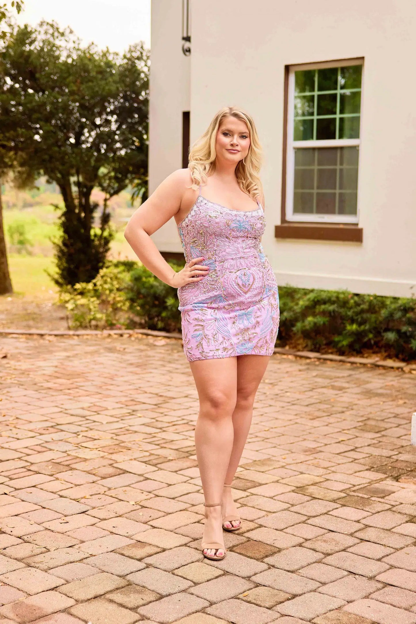 Elevate your special occasion with the Primavera Couture 14090, a plus-size short homecoming dress designed to impress. Featuring intricate beadwork and a flattering corset silhouette, this cocktail gown offers a sophisticated scoop neckline that enhances elegance and comfort. Perfect for making a memorable entrance, it combines style and confidence in one stunning piece.

Sizes: 14-24

Colors: Black, Ivory, Orchid